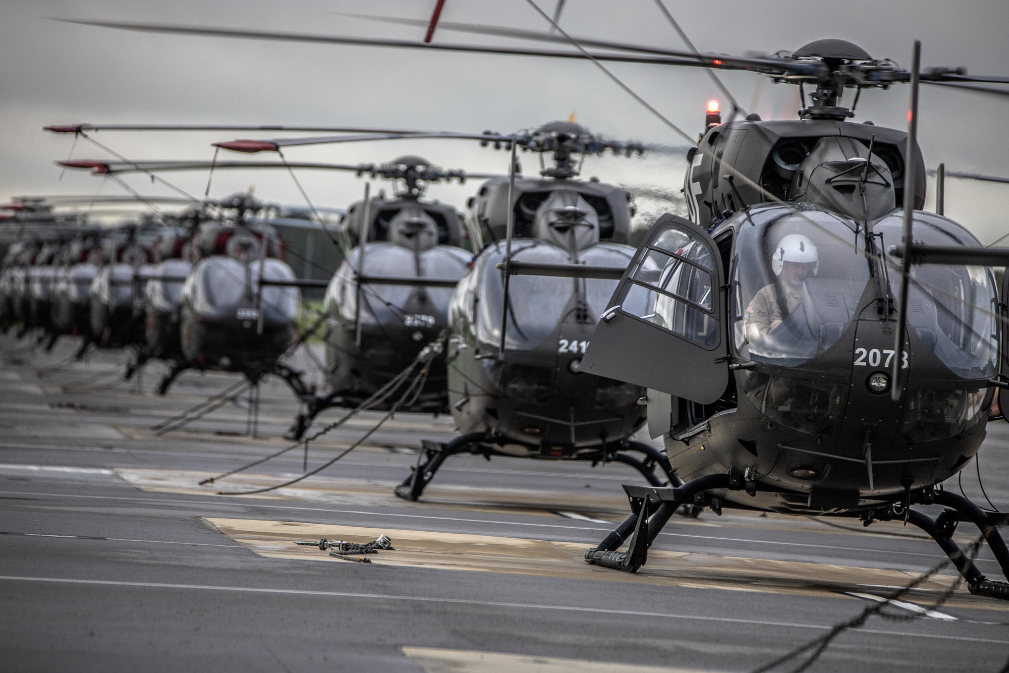 Helicopter fleet at dusk — operations at scale